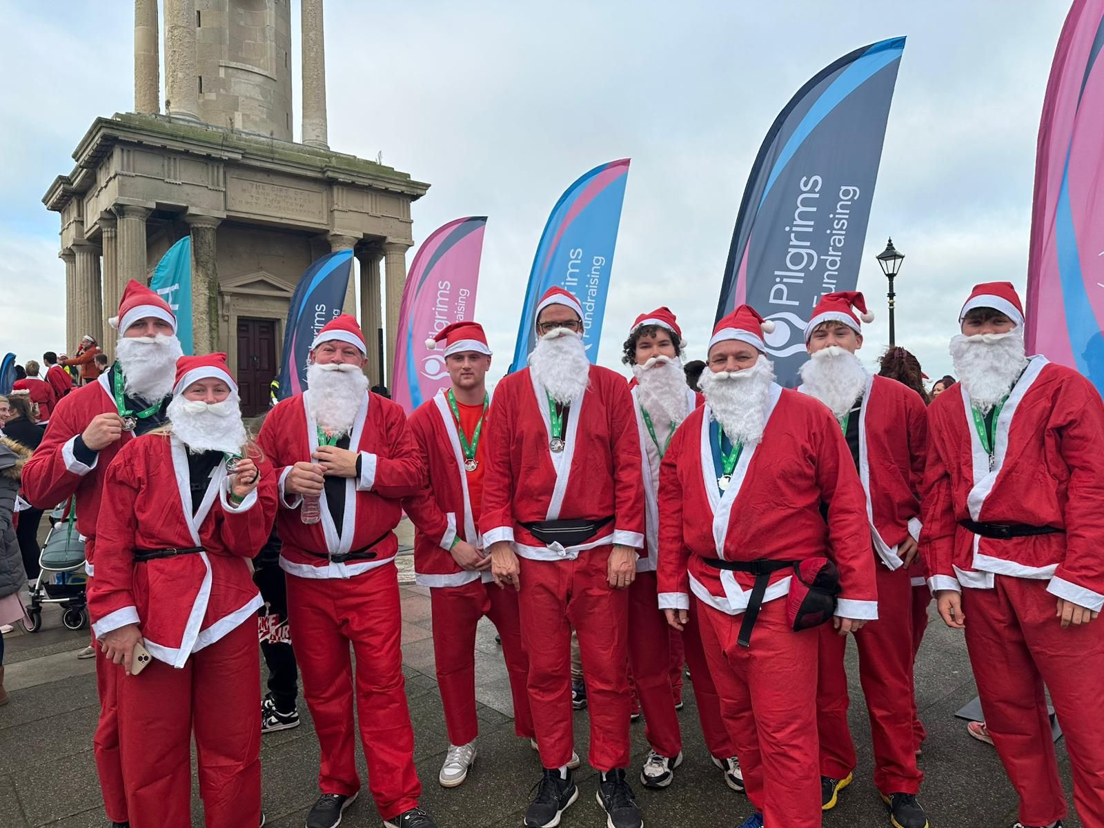 Pilgrims Hospice Santa Run Woodley Coles LLP